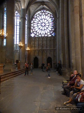 View along the transept of La basilique Saint-Nazaire from the northern end to the southern end and the rose window