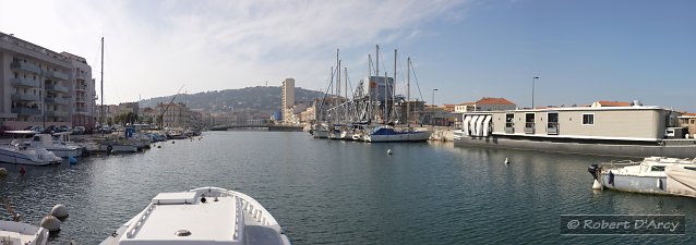 View of Sète and Mont St Clair in the distance, looking along Canal de la Peyrade from Quai du Mas Coulet